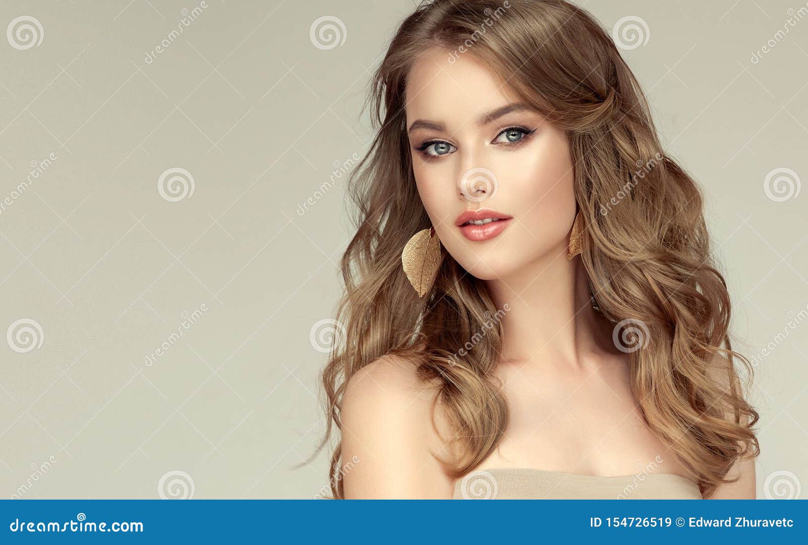 Young, Blonde Haired Beautiful Model with Long, Well Groomed Hair, Dressed  in Golden Earrings. Perfect Freely Laying Hairstyle. Stock Image - Image of  curly, hairdressing: 154726519