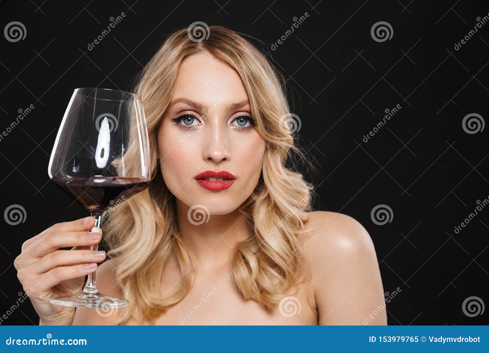 Young Blonde Woman With Bright Makeup Red Lips Posing Isolated Over