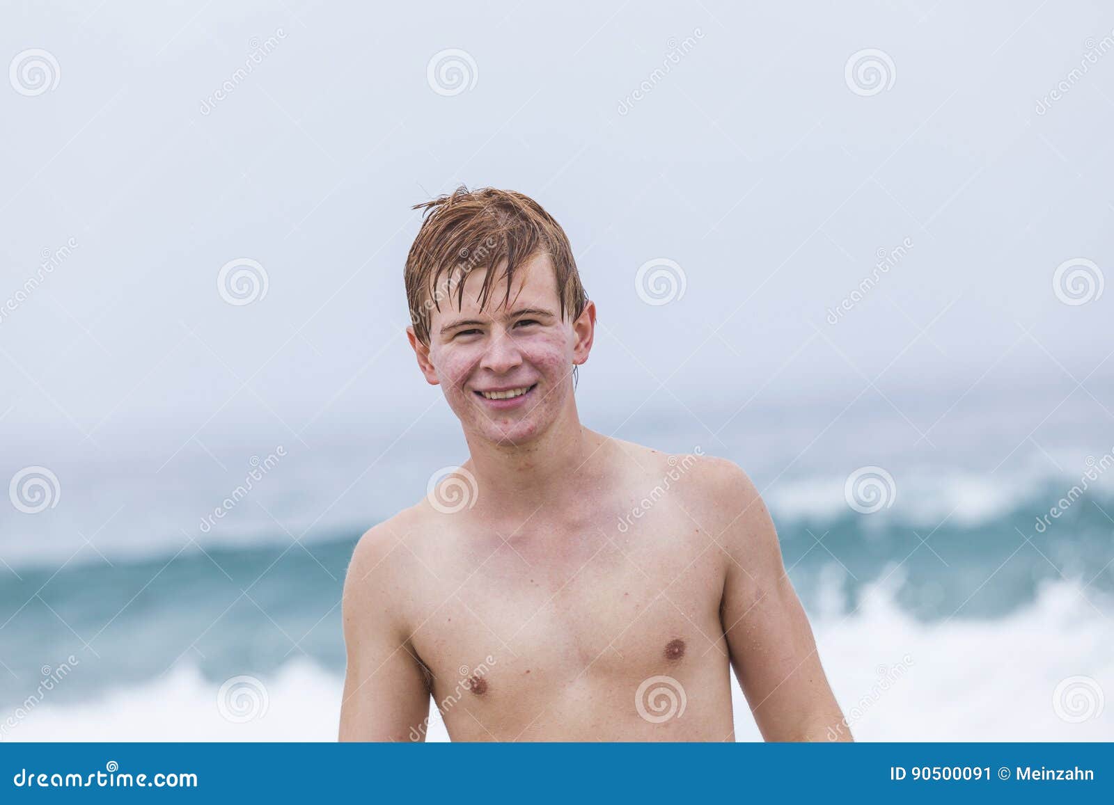 Young boy at the beach stock image. Image of adolescent - 90500091