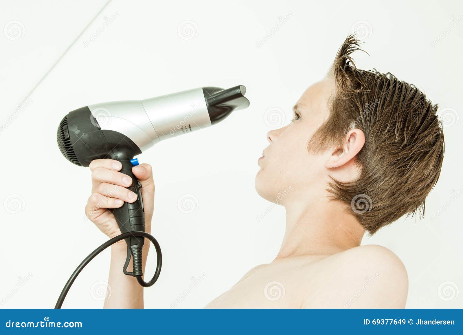 Young Boy Blowing His Hair Dry with a Hairdryer Stock Image - Image of  portrait, head: 69377649