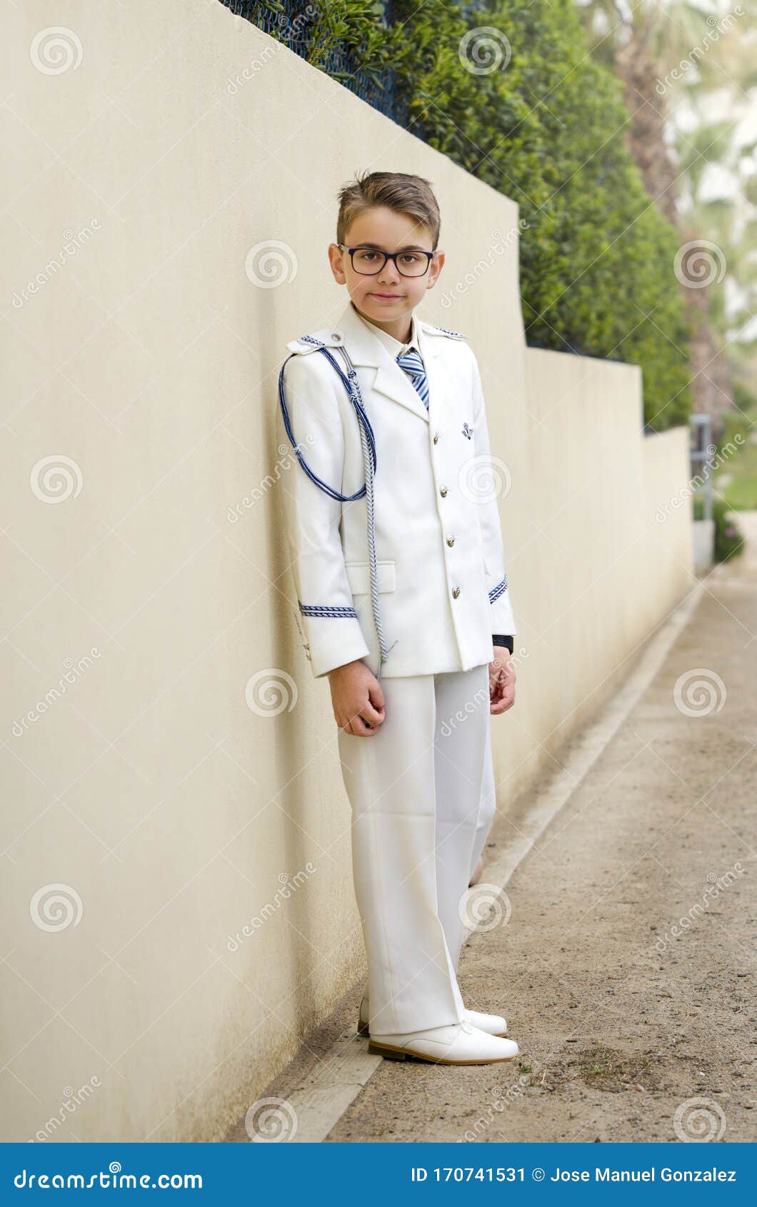 Young Boy Celebrating His First Holy Communion Wearing A Sailor Suit ...