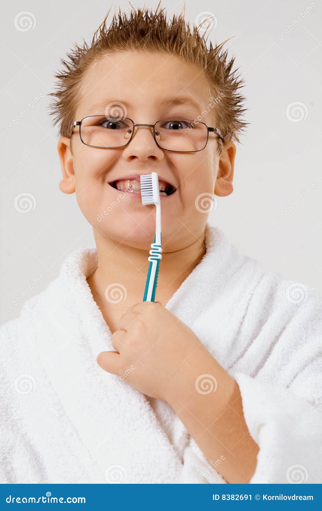 Young boy cleaning teeth stock image. Image of mouth, look 8382691