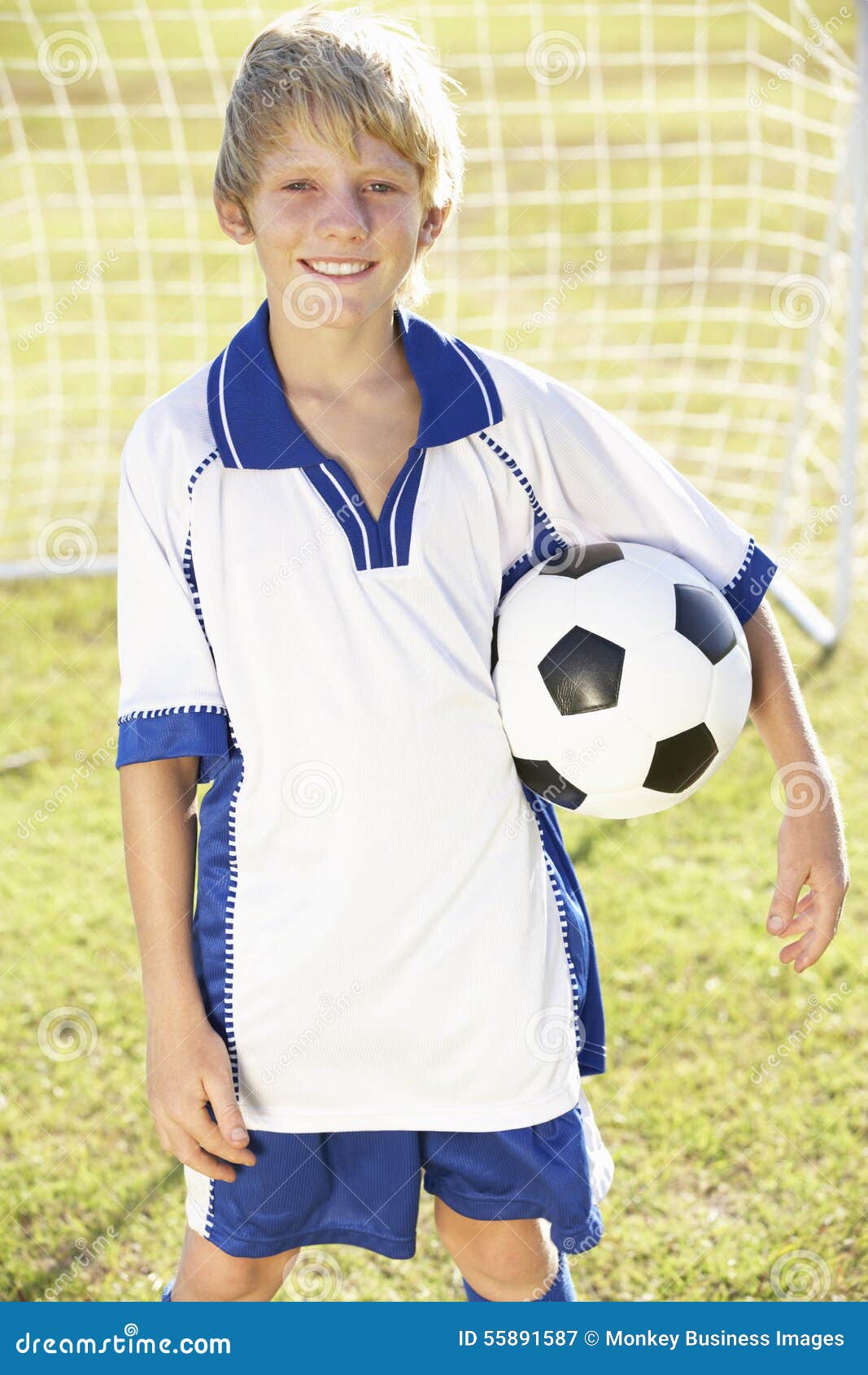 Young Boy Dressed in Soccer Kit Standing by Goal Stock Image Image of