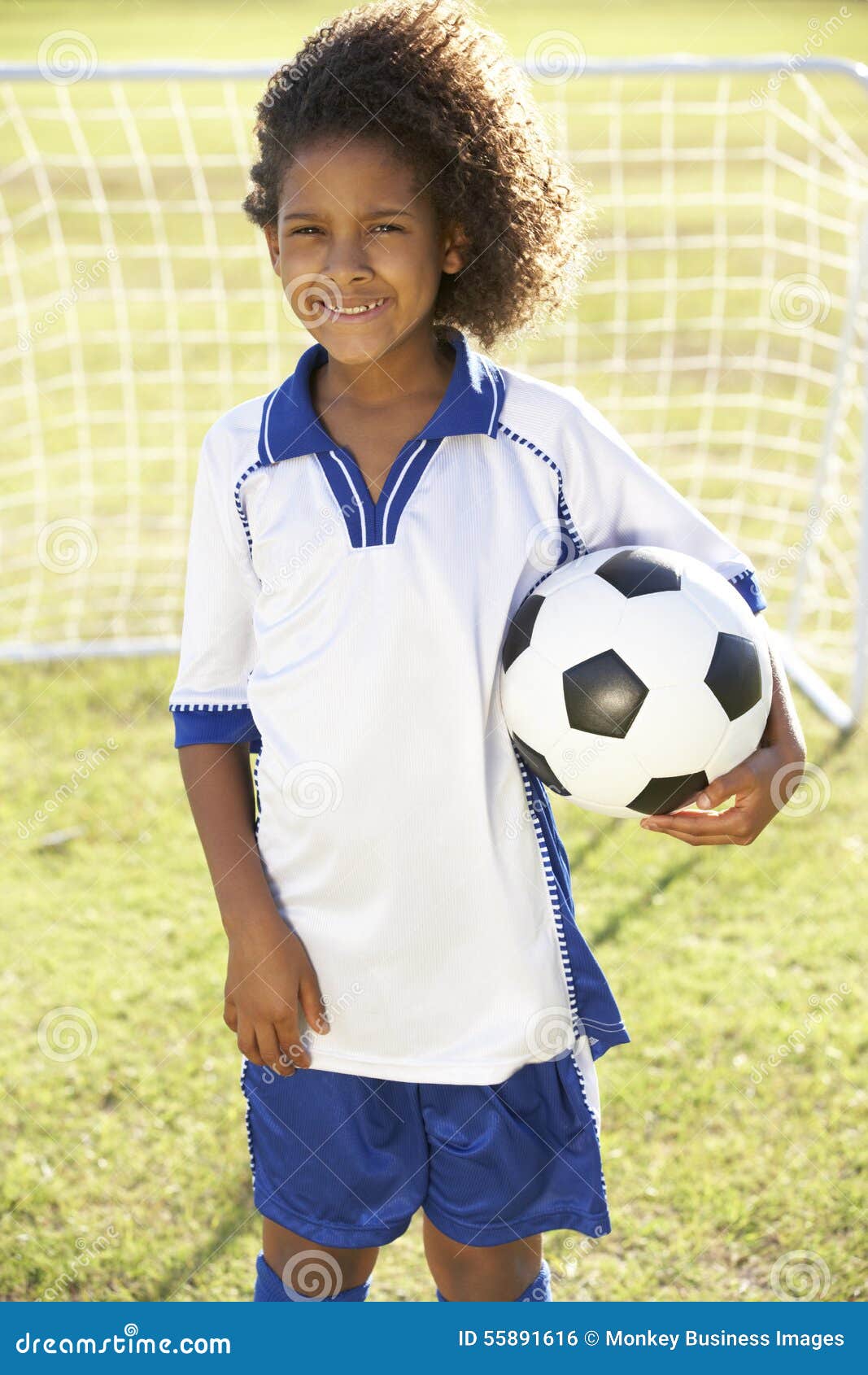 Young Boy Dressed in Soccer Kit Standing by Goal Stock Photo Image of