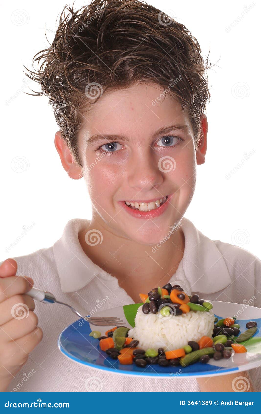 Young Boy Eating Healthy Rice, Beans & Veggies Ver Stock Image - Image