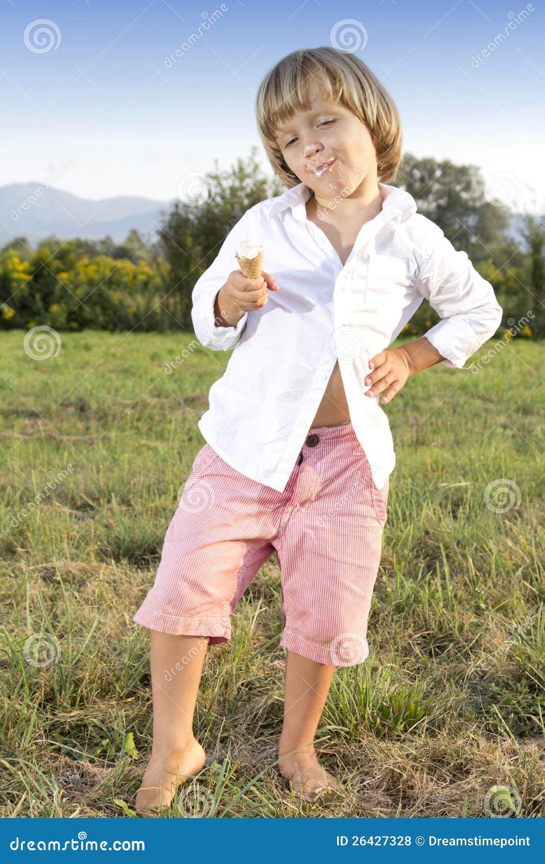 Young Boy Eating a Tasty Ice Cream Stock Photo - Image of daytime ...