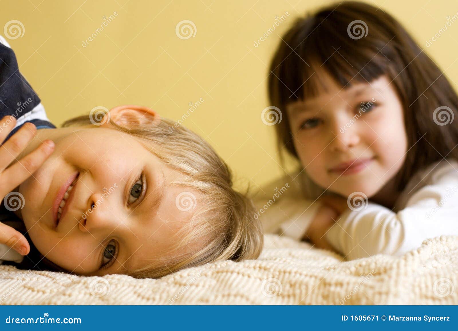 Young Boy and Girl at Home stock image. Image of giving 1605671