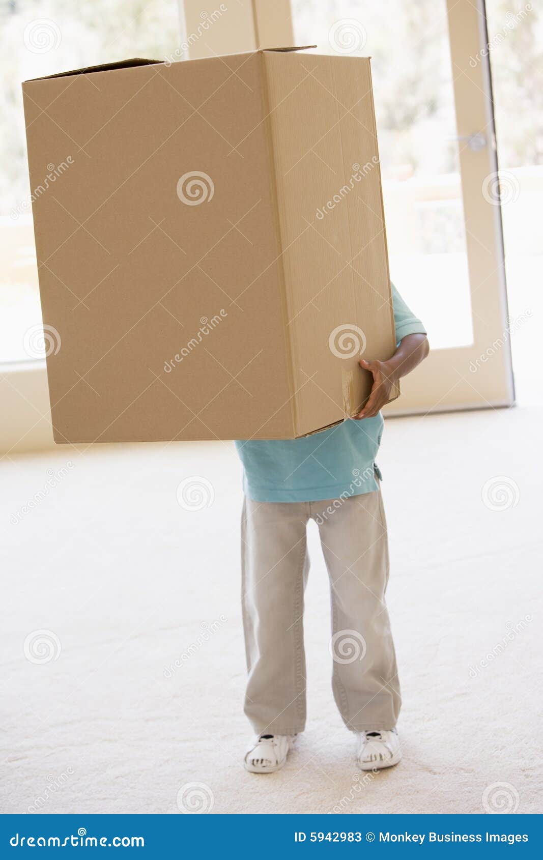 Young Boy Holding Box in New Home Stock Image Image of excited