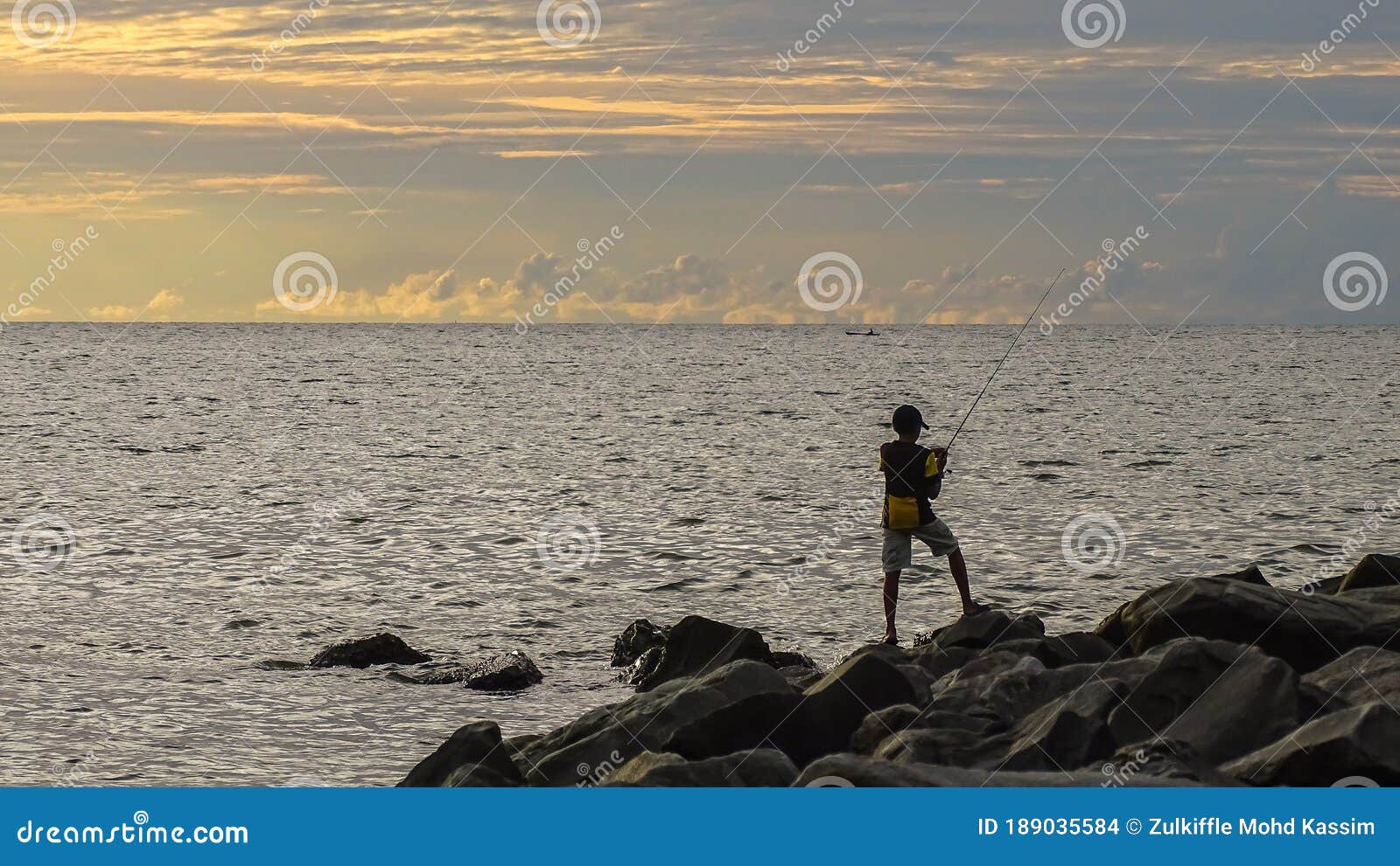 https://thumbs.dreamstime.com/z/young-boy-home-fishing-rod-peace-park-layang-layangan-beach-labuan-pearl-borneo-malaysia-189035584.jpg