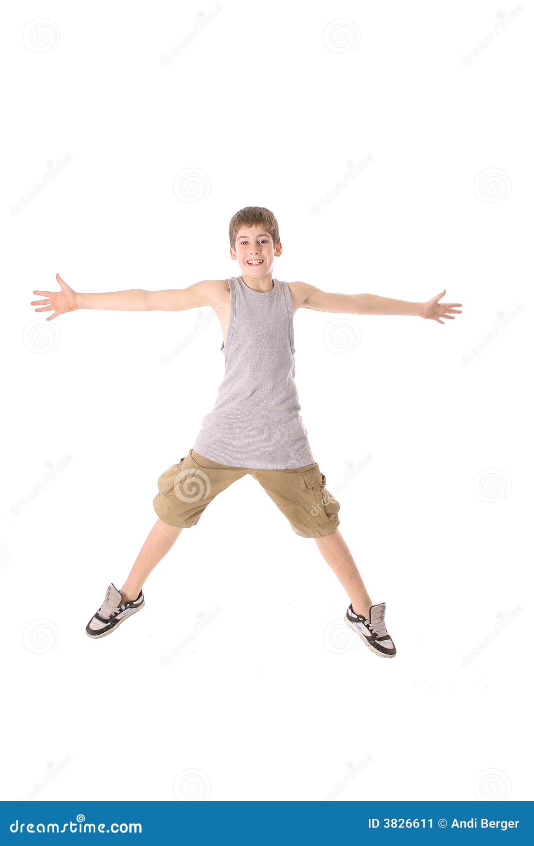 Young Boy Jumping Hands Out Stock Image Image of male, jump 3826611