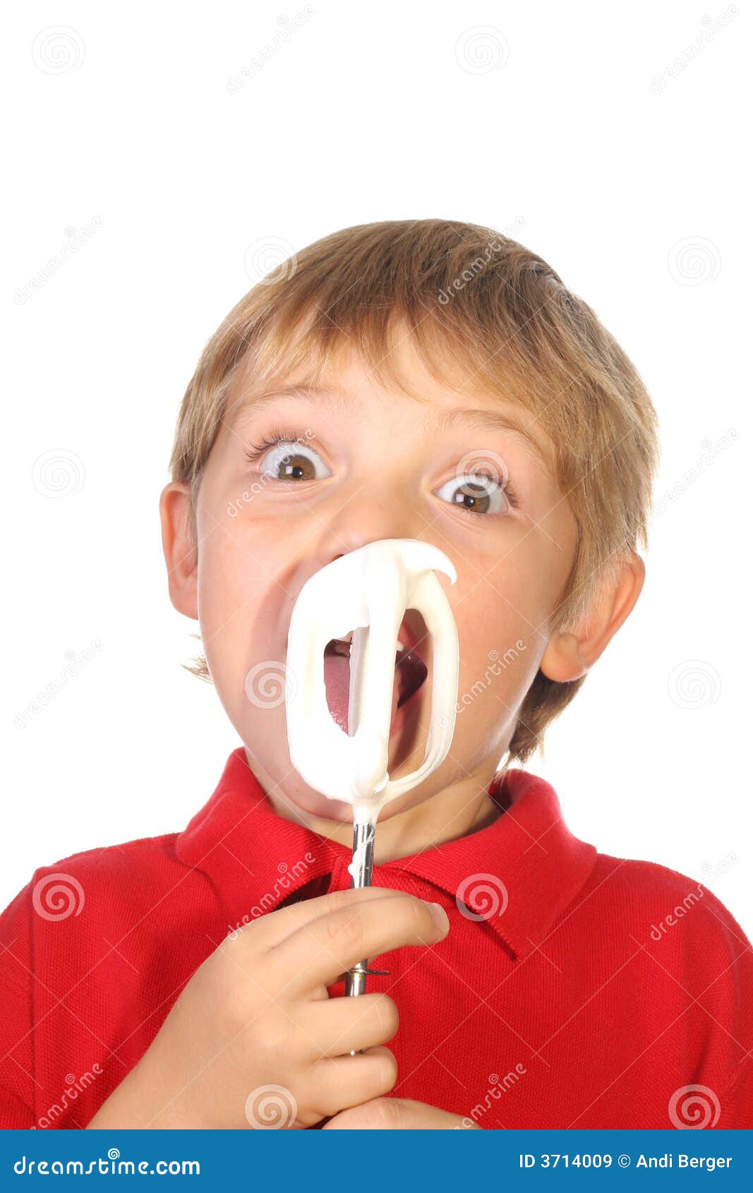 Young boy licking beaters stock image. Image of icing 3714009