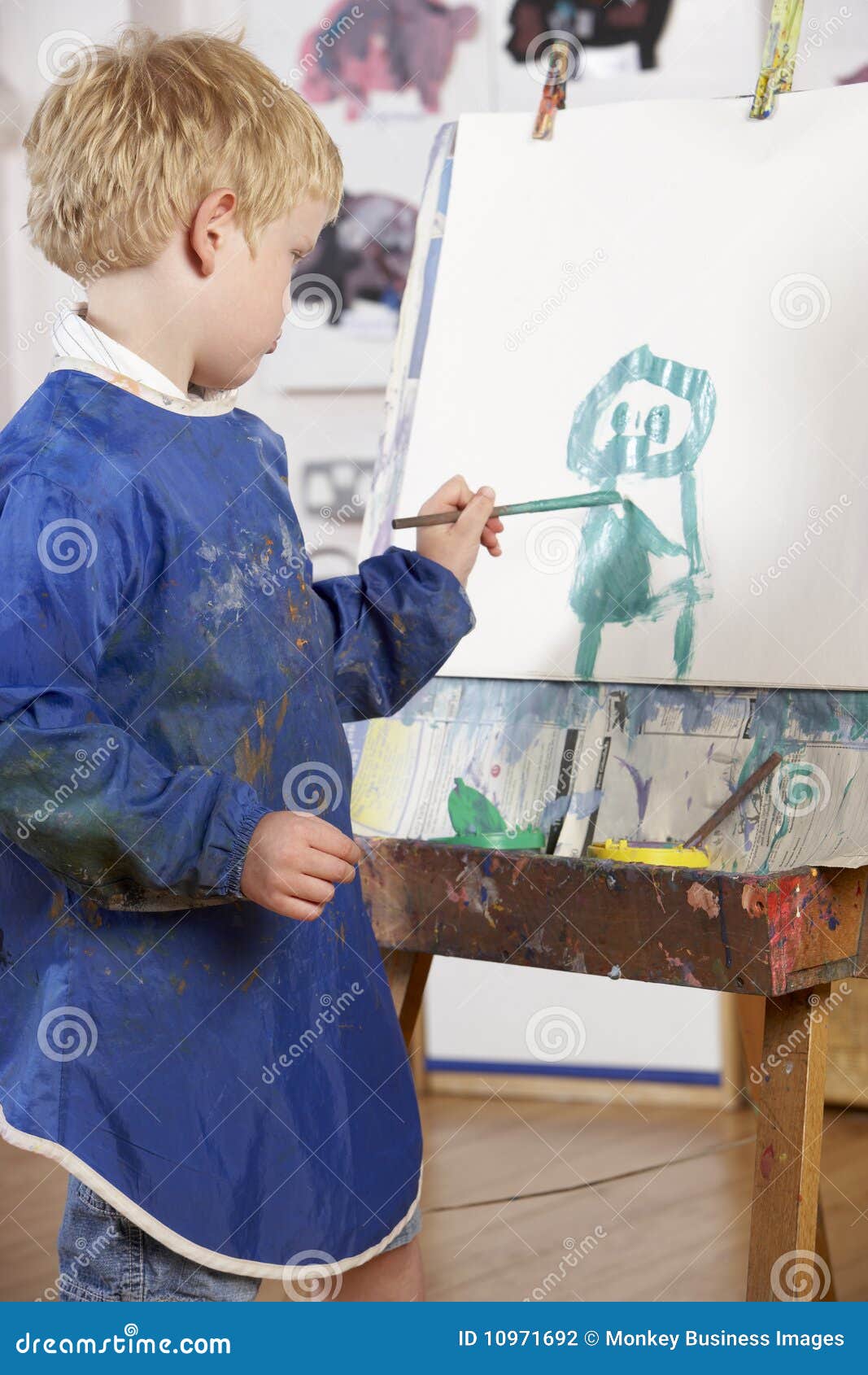 Young Boy Painting stock photo. Image of school, four 10971692