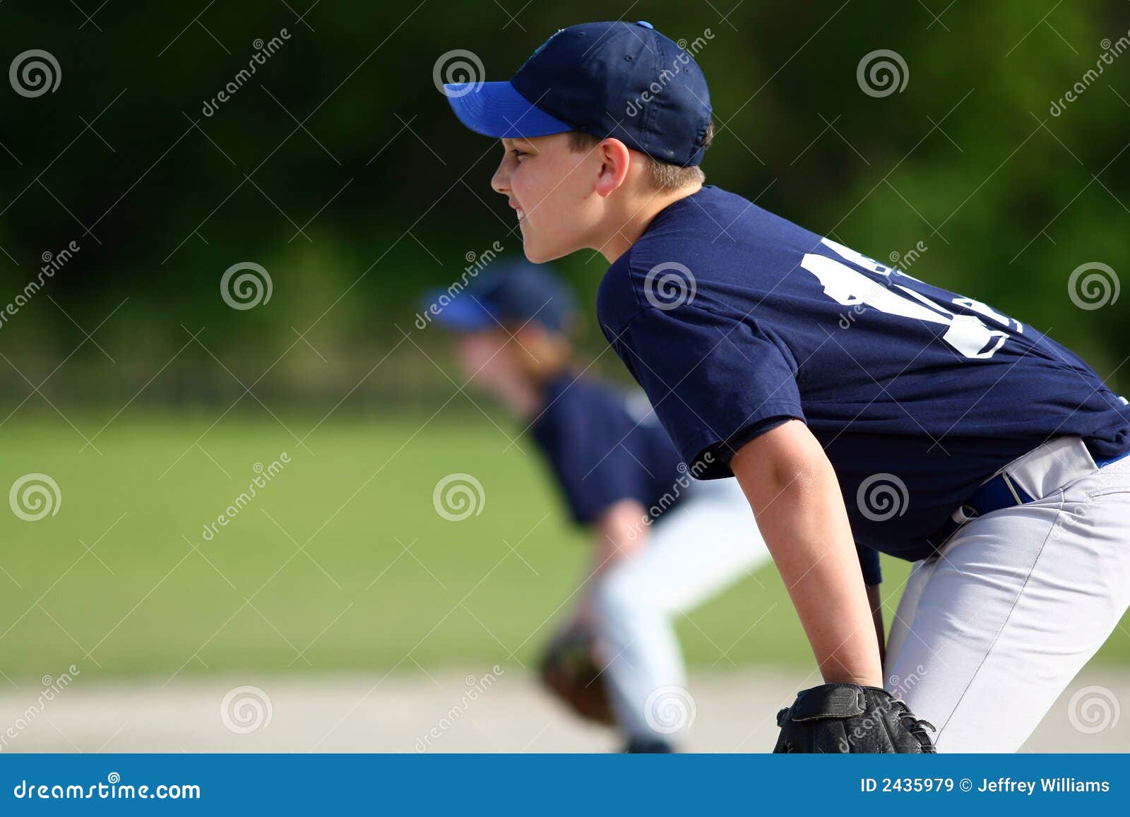 Young boy playing baseball stock image. Image of fielder 2435979