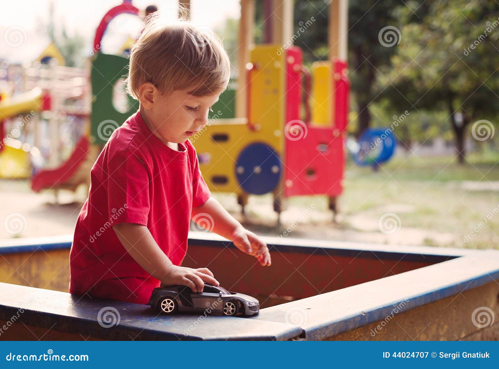 Young Boy Playing with Toy Car in Sandbox Stock Image Image of sweet