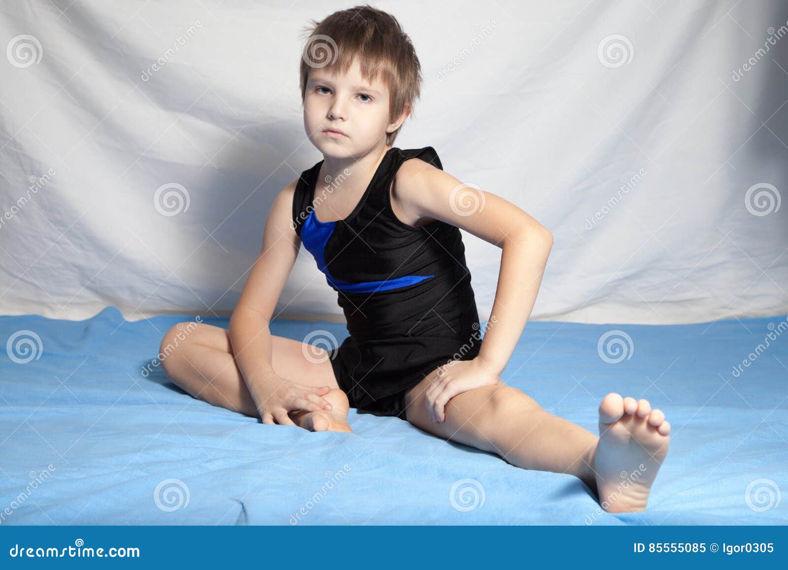 Young boy practices yoga stock image. Image of practice 85555085