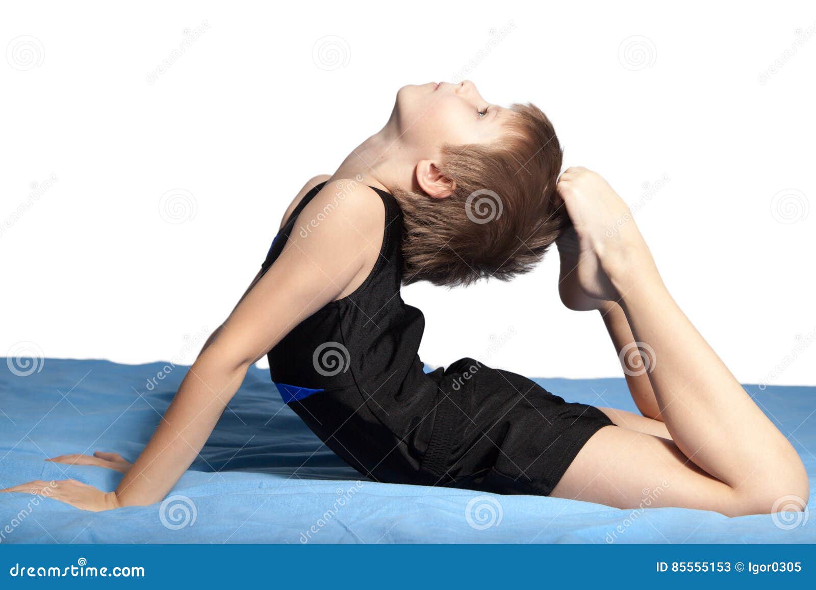 Young boy practices yoga stock image. Image of exercise 85555153