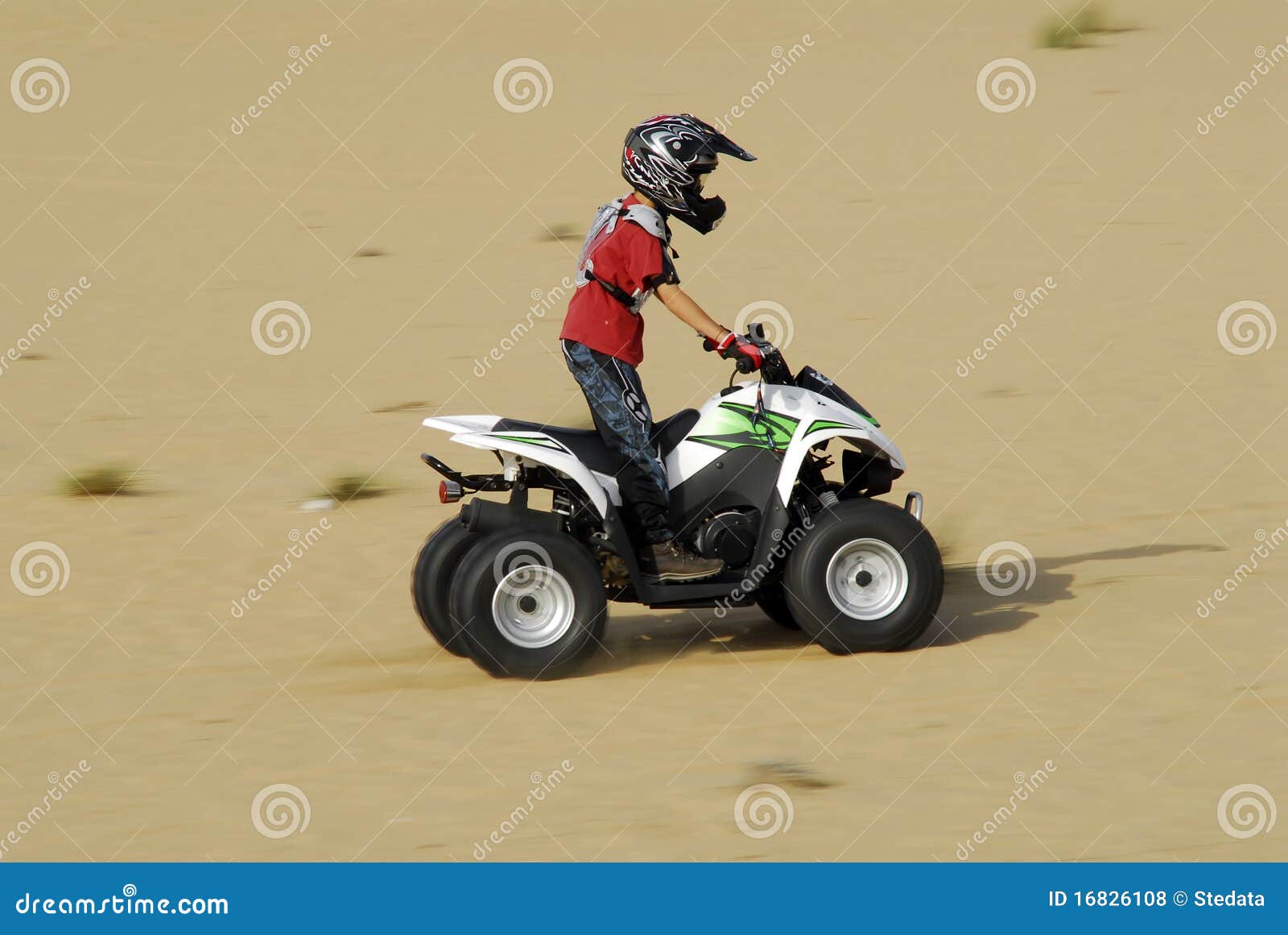 Young Boy Quad Biking in the Dunes Stock Photo Image of adventure