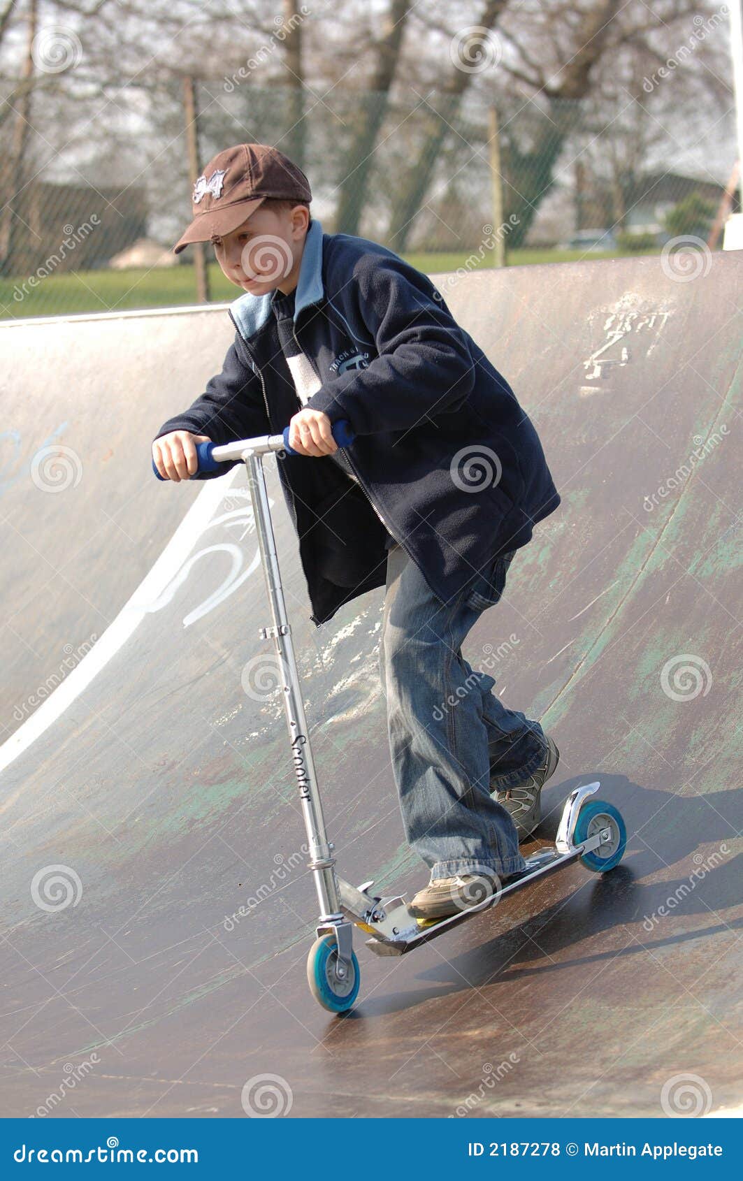Young Boy on Scooter stock photo. Image of child, pushing - 2187278