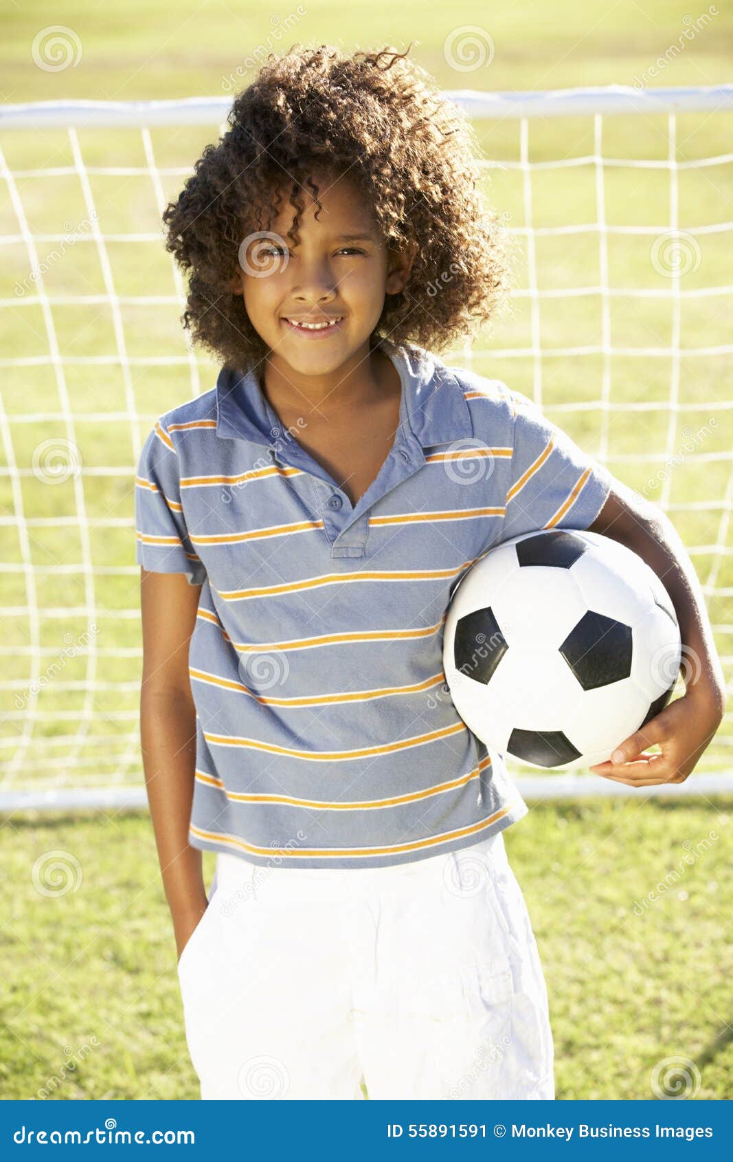 Young Boy with Soccer Ball Standing by Goal Stock Image - Image of ...
