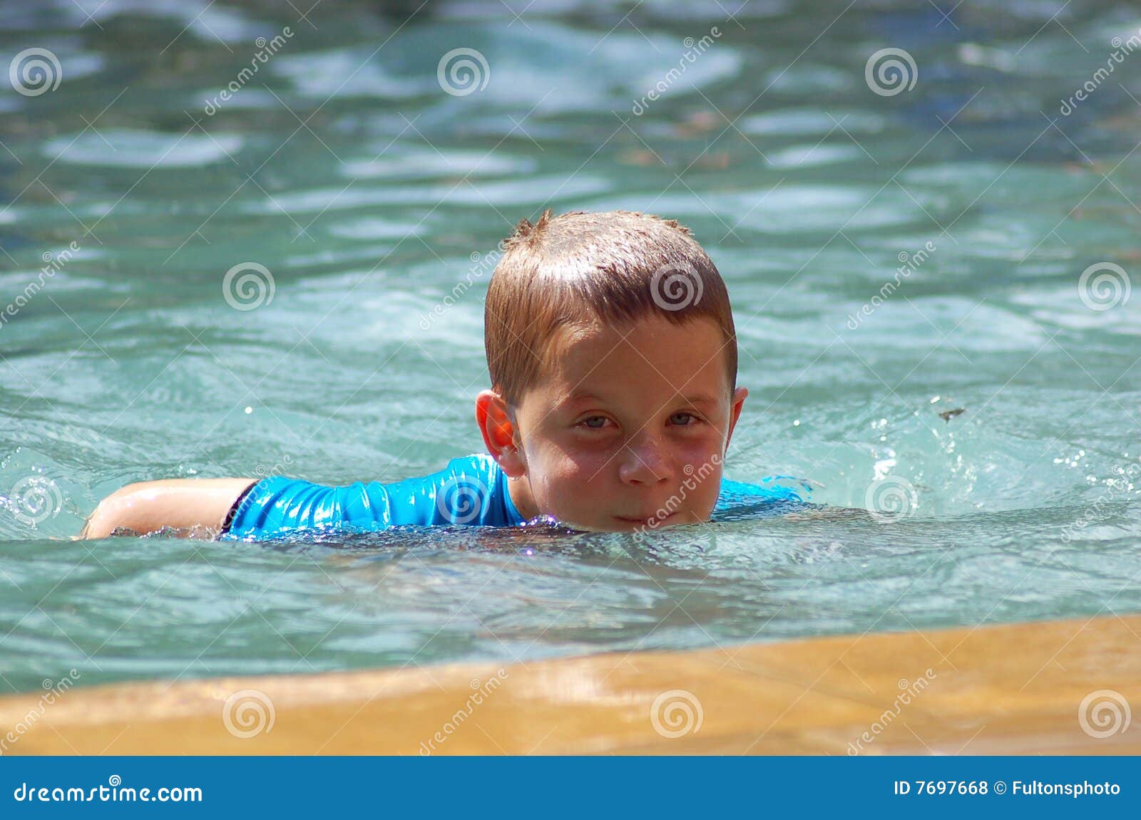 Young Boy Swimming stock photo. Image of enjoyment, cool 7697668