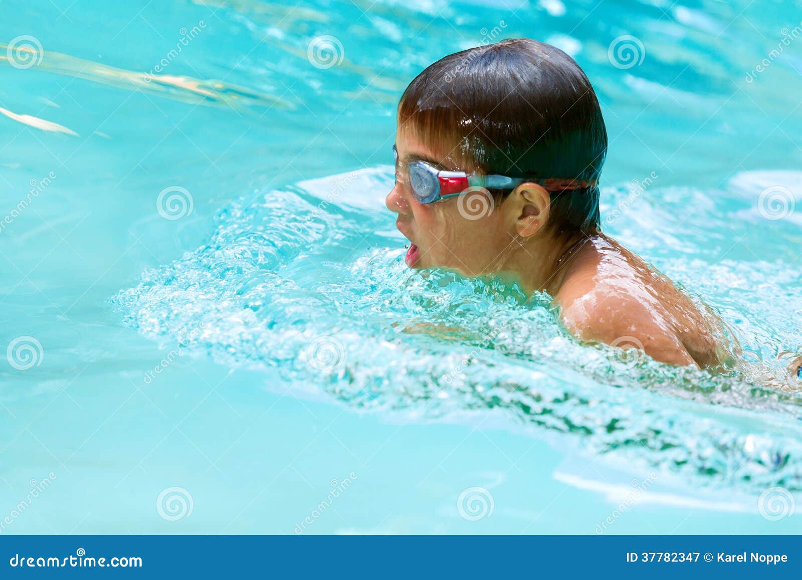 Young boy swimming. stock image. Image of practicing 37782347