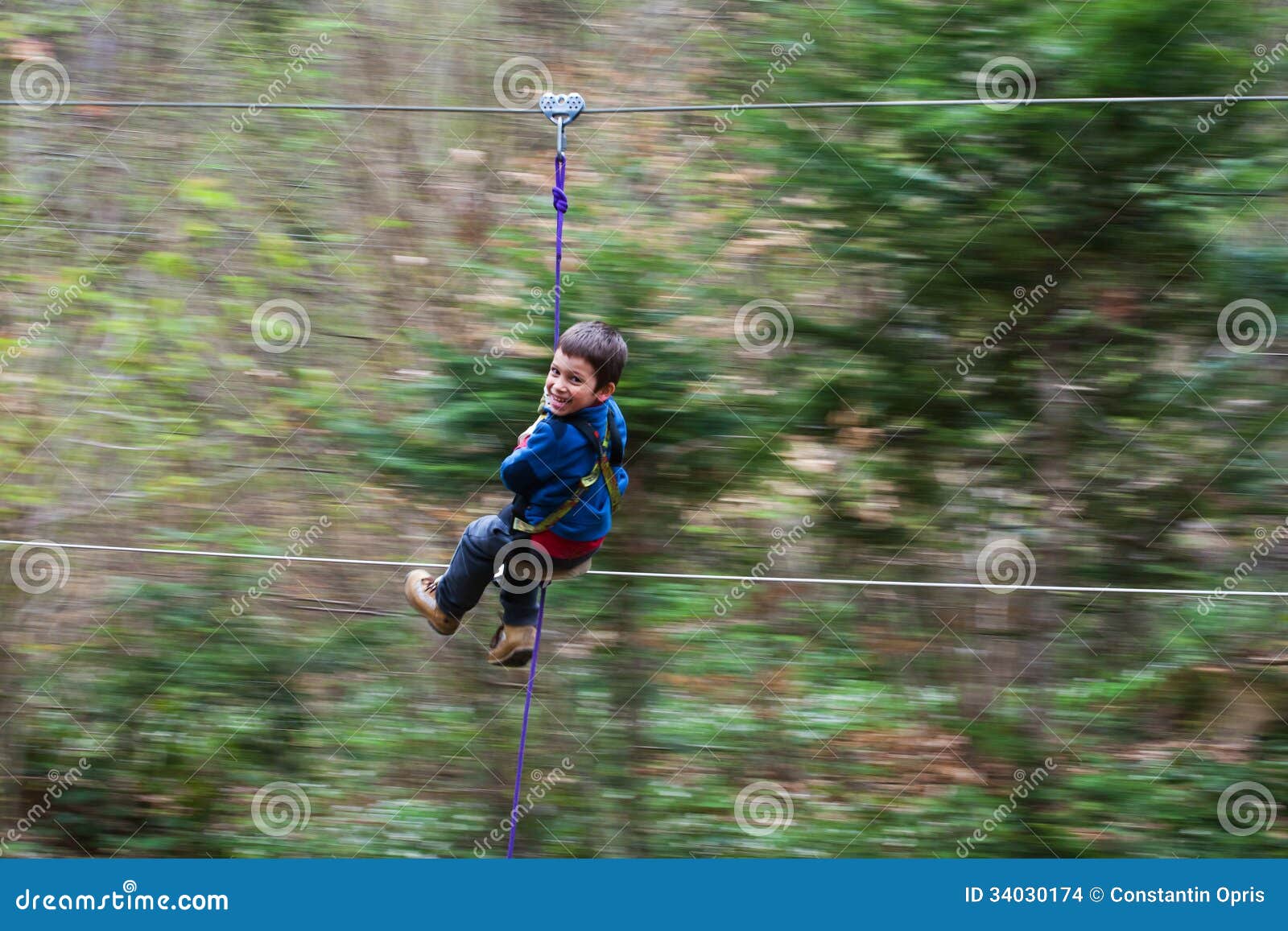 Young Boy On Zip Line Stock Images Image 34030174