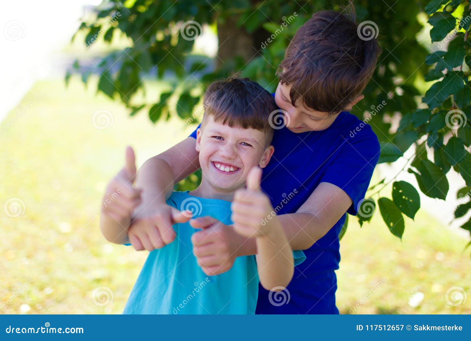 Young Boys Have Fun Together in Park Stock Image Image of carefree