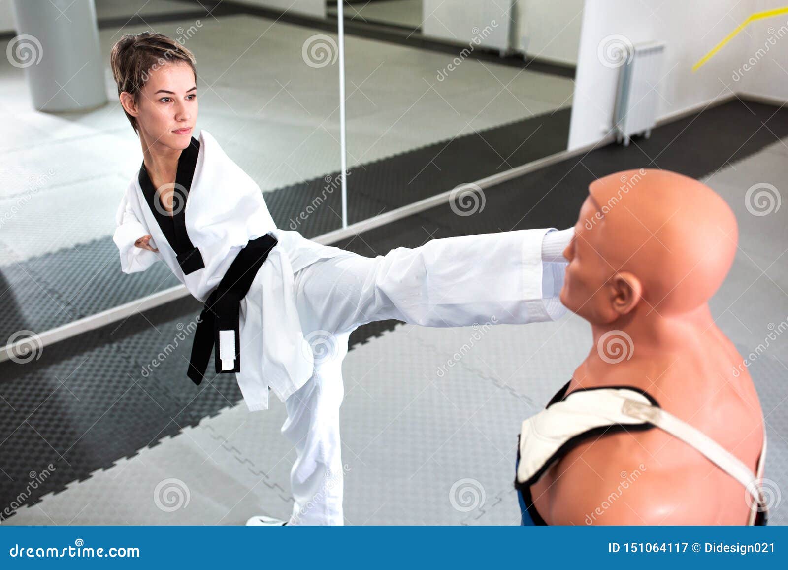 young brave and physically disabled woman training para-taekwondo