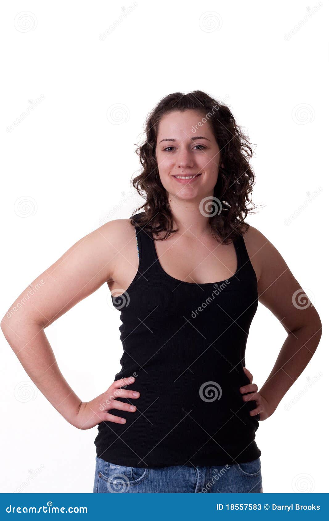Fitness Young Pretty Woman In Black Leggings And Tank Top Posing