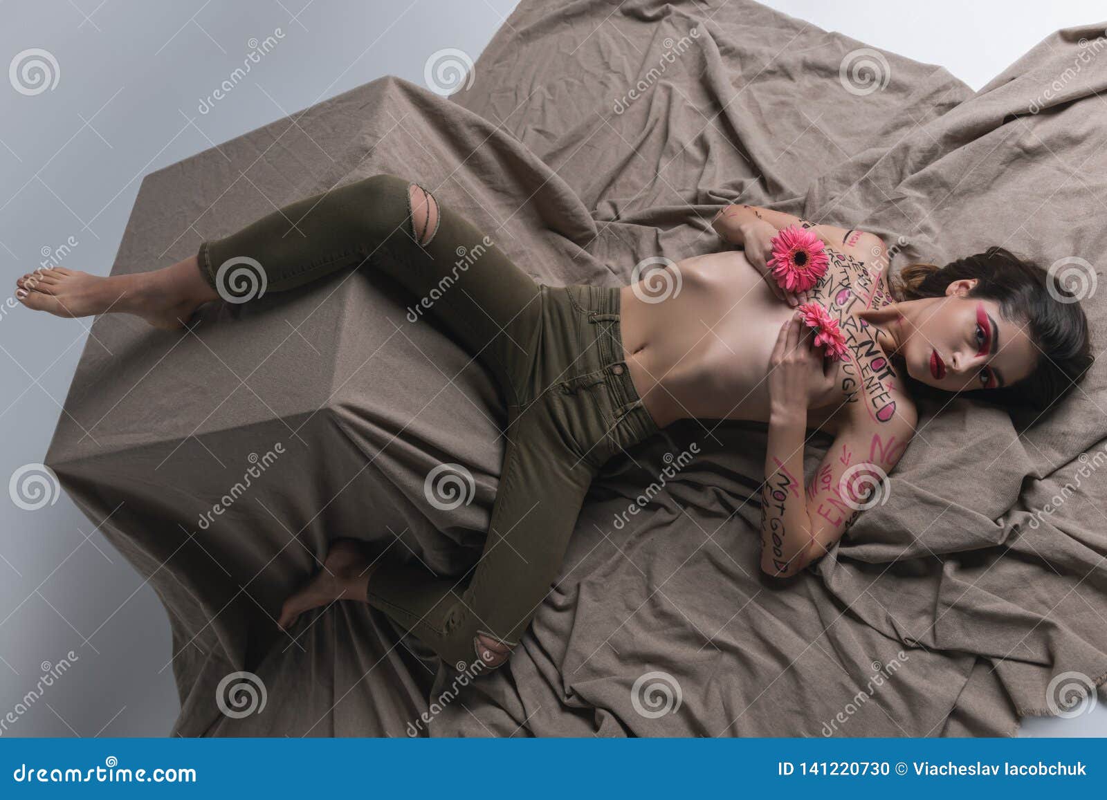 Young Brunette Pretty Slim Model in Tight Jeans Looking Aggressively Stock  Photo - Image of graceful, feminism: 141220730