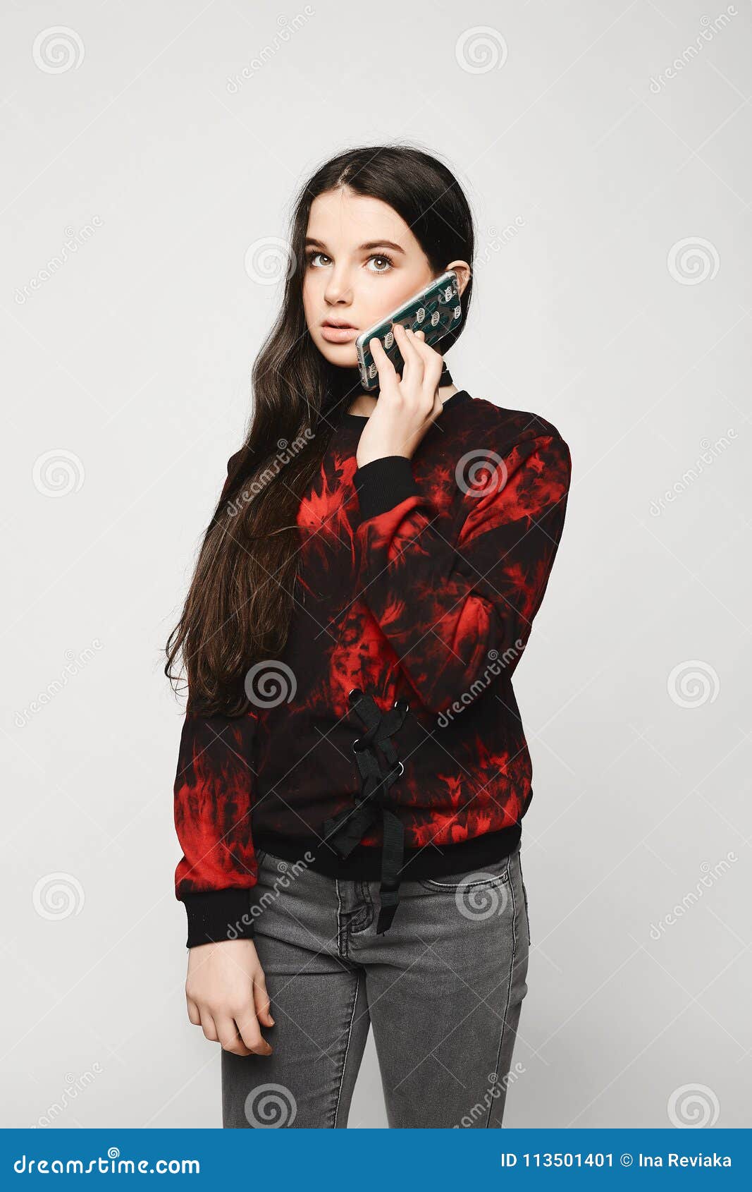 Young Brunette Teen Girl Talking On The Phone, Isolated On A White ... amateur hq photo Young Brunette Teen Girl Talking On The Phone, Isolated On A White ... picture