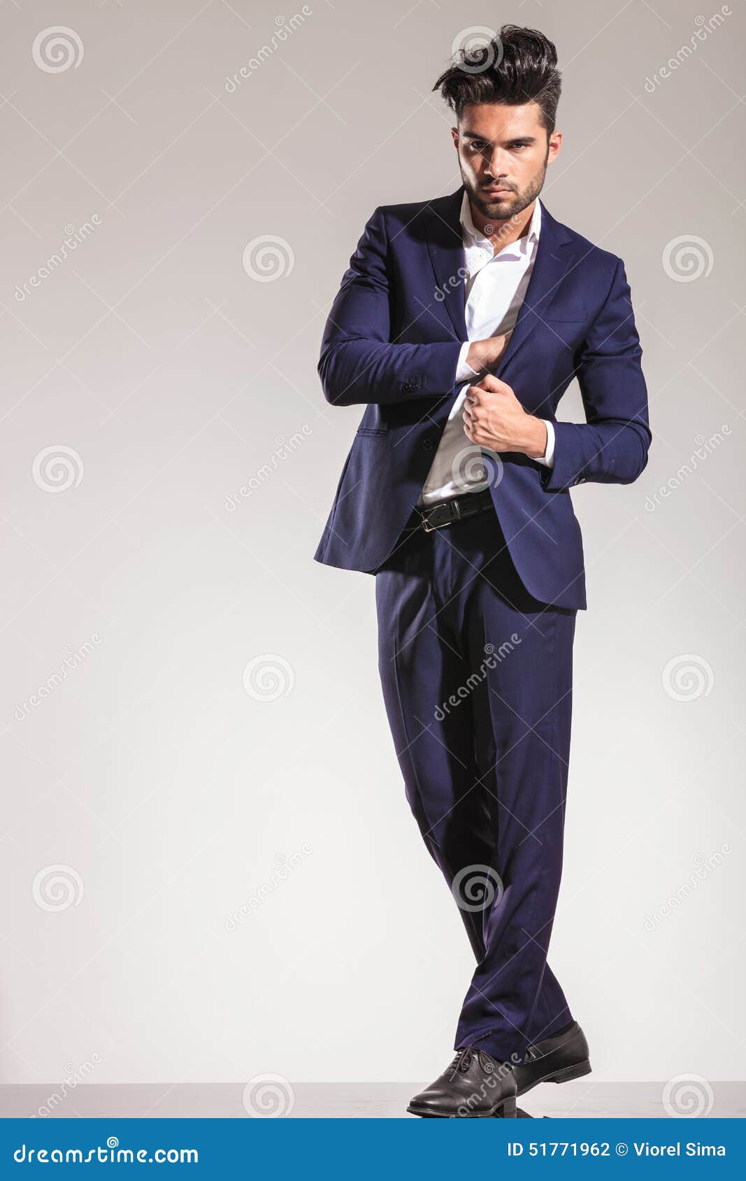 Young Business Man Standing And Pulling His Coat Stock Photo - Image of ...