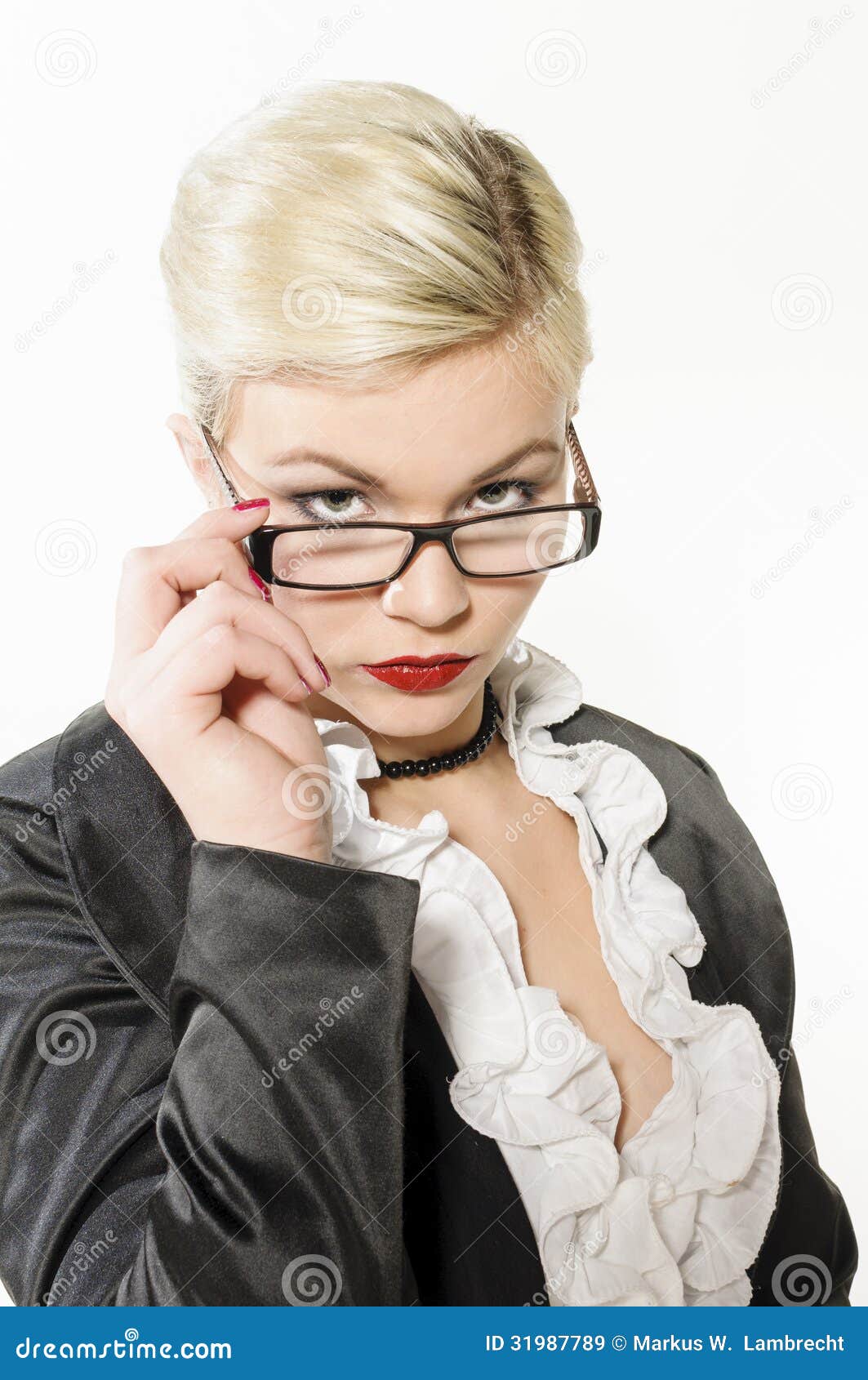Young Business Woman Looking Over Glasses Royalty Free 