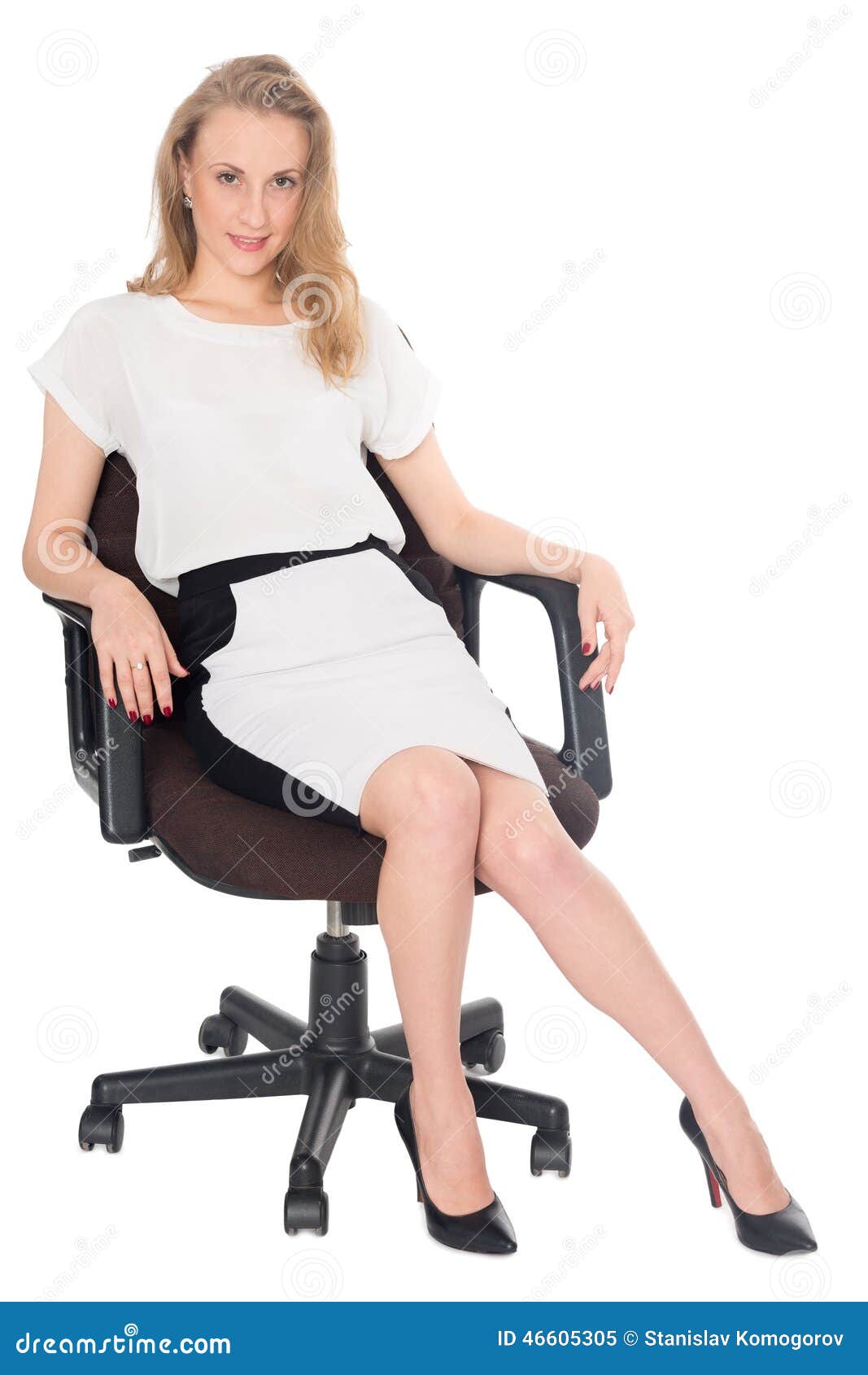 Young Business Woman Sitting In An Office Chair Stock Image