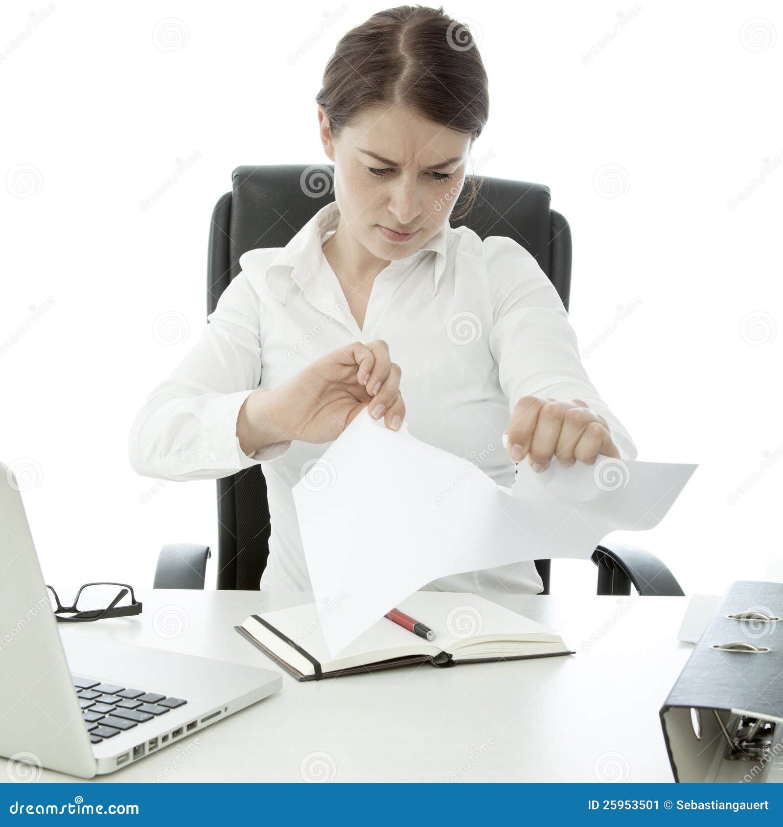 young business woman tear paper on her desk