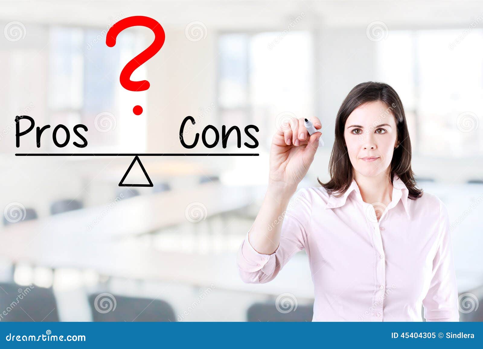 young business woman writing pros and cons compare on balance bar. office background.