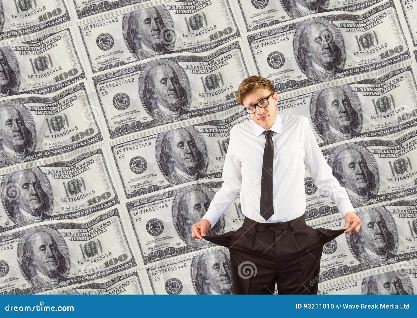 Young Businessman with Empty Pockets. Money Background Stock Photo