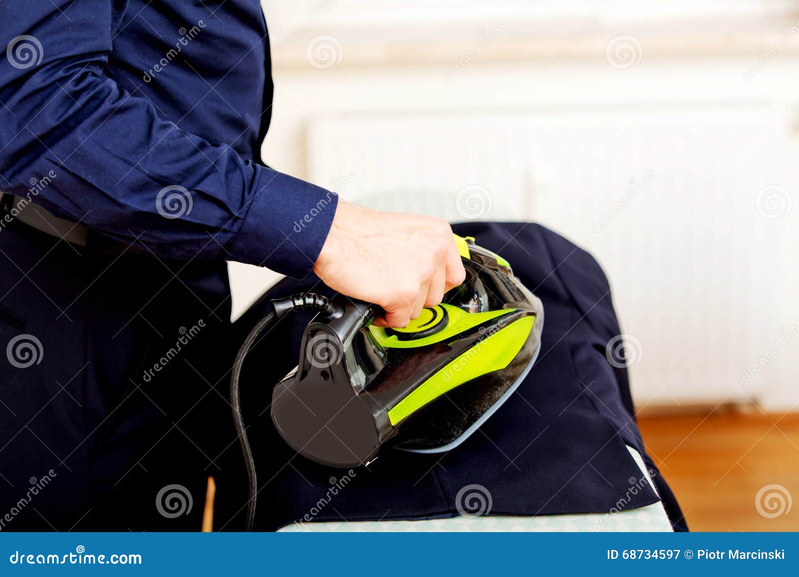 Young Businessman Ironing His Jacket Stock Image Image of house