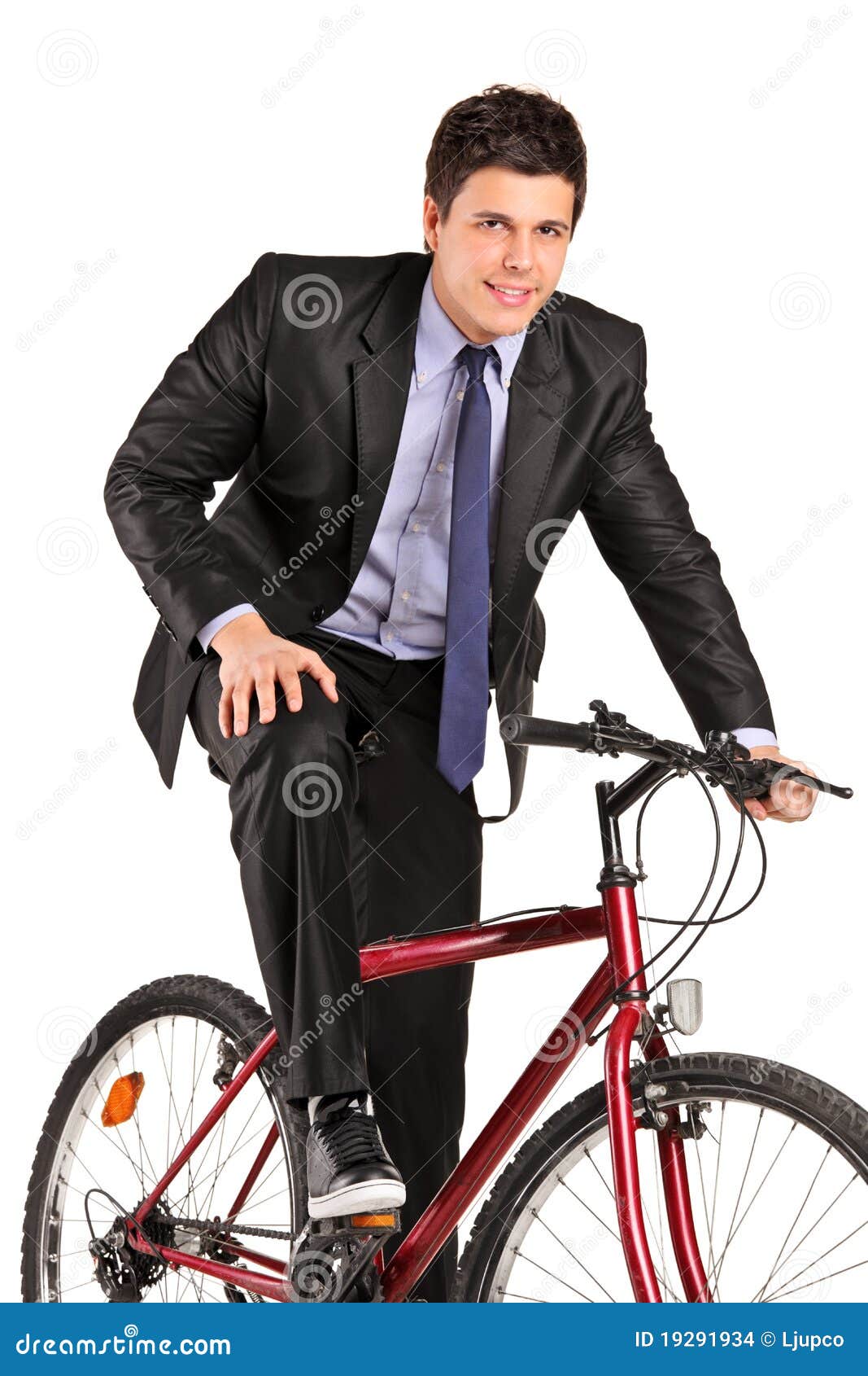Young hipster businessman going to work on bike. Eco friendly