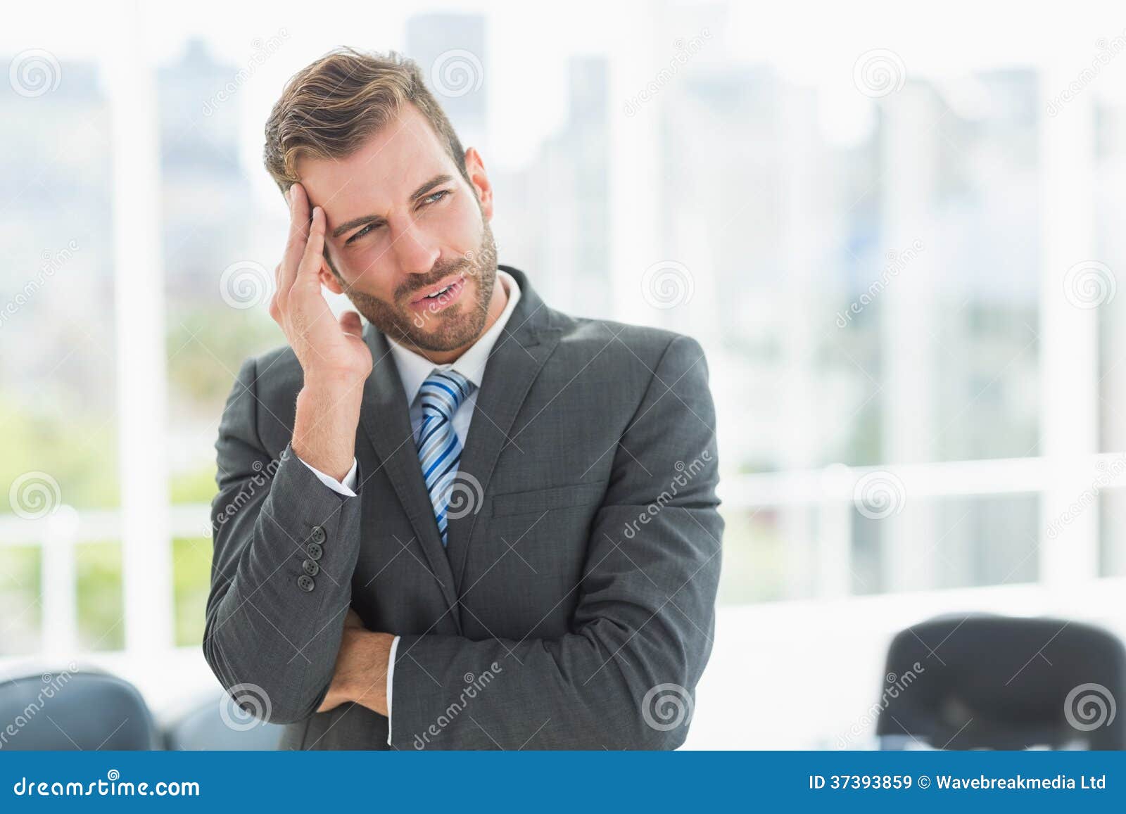 Young Businessman with Severe Headache in Office Stock Image Image of