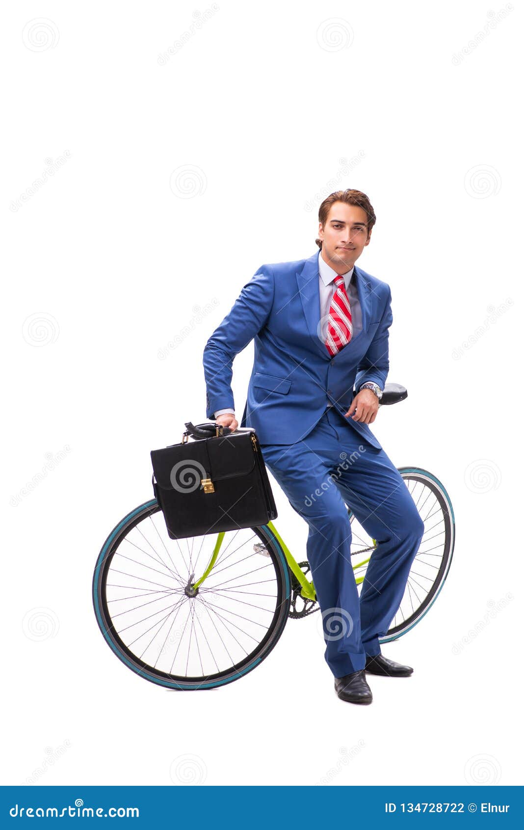 The Young Businessman Using Bike To Commute To the Office Stock Photo