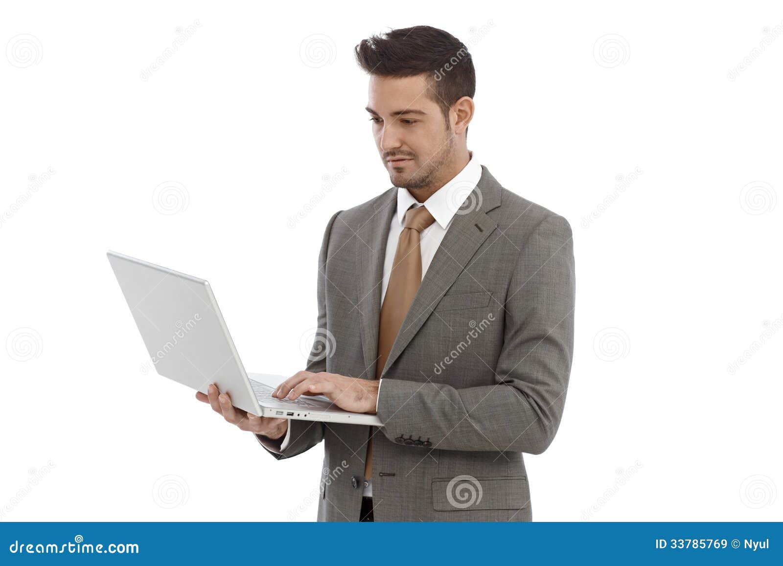 Young Businessman Using Laptop Stock Image Image of 2530, color 33785769
