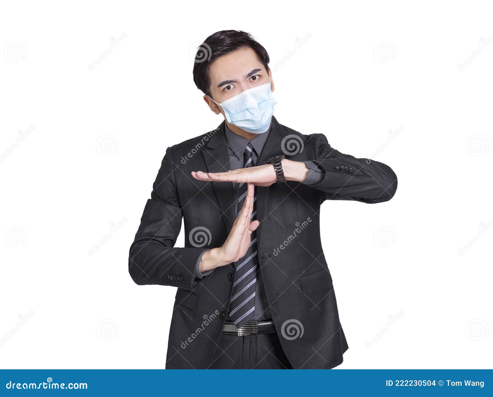 young businessman wearing medical mask tired and bored, making a timeout gesture, needs to stop because of work stress