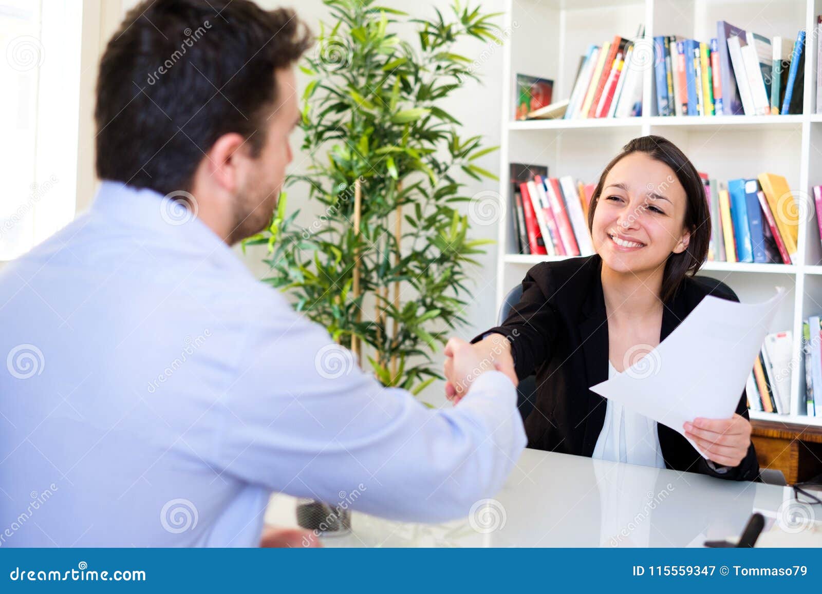 handshake after successful job interview and cv