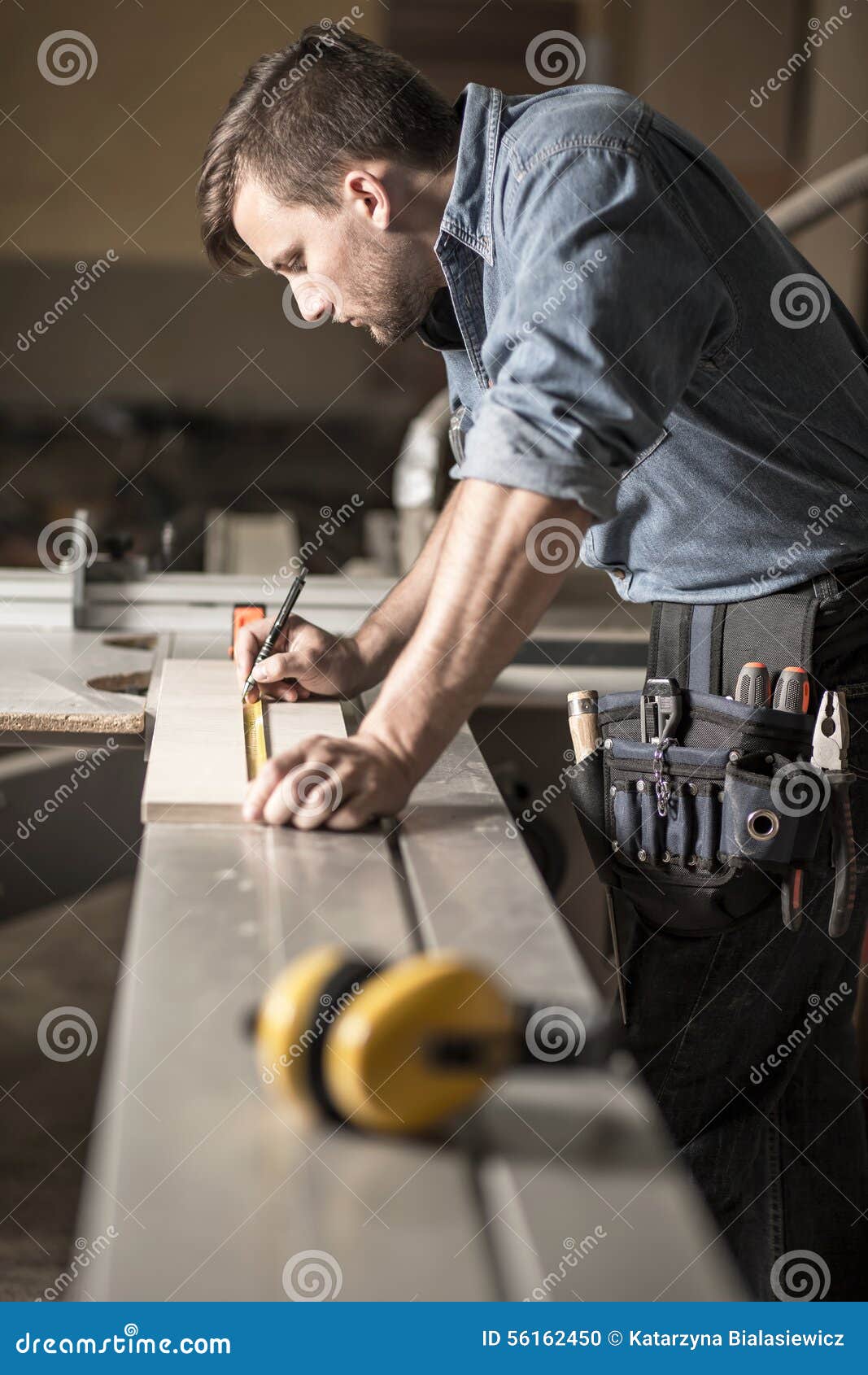 Young carpenter at work stock photo. Image of tool ...