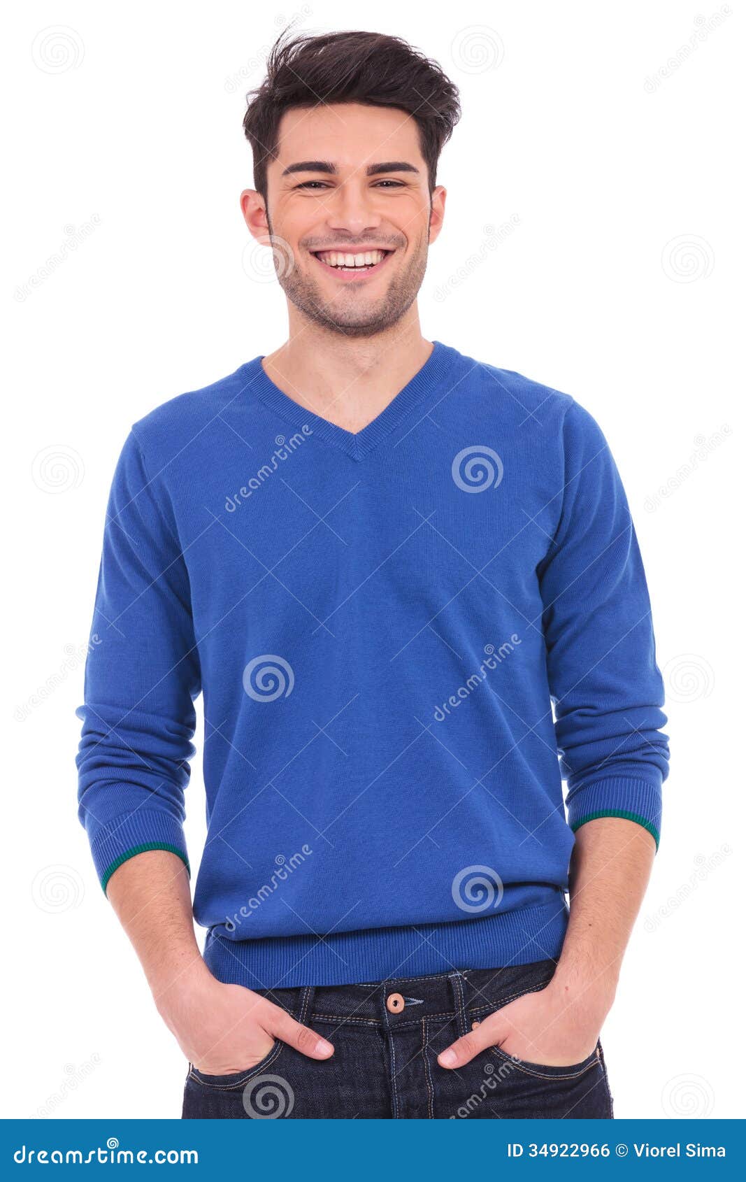 Young Casual Man with Hands in Pockets Smiling Stock Photo - Image of ...