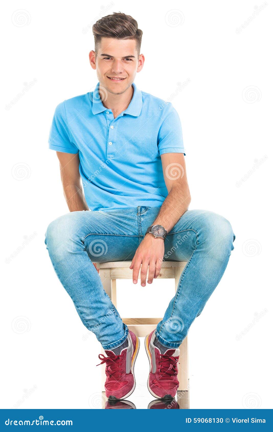 Young Casual Man Sitting on a Chair. Stock Photo - Image of smile, male ...