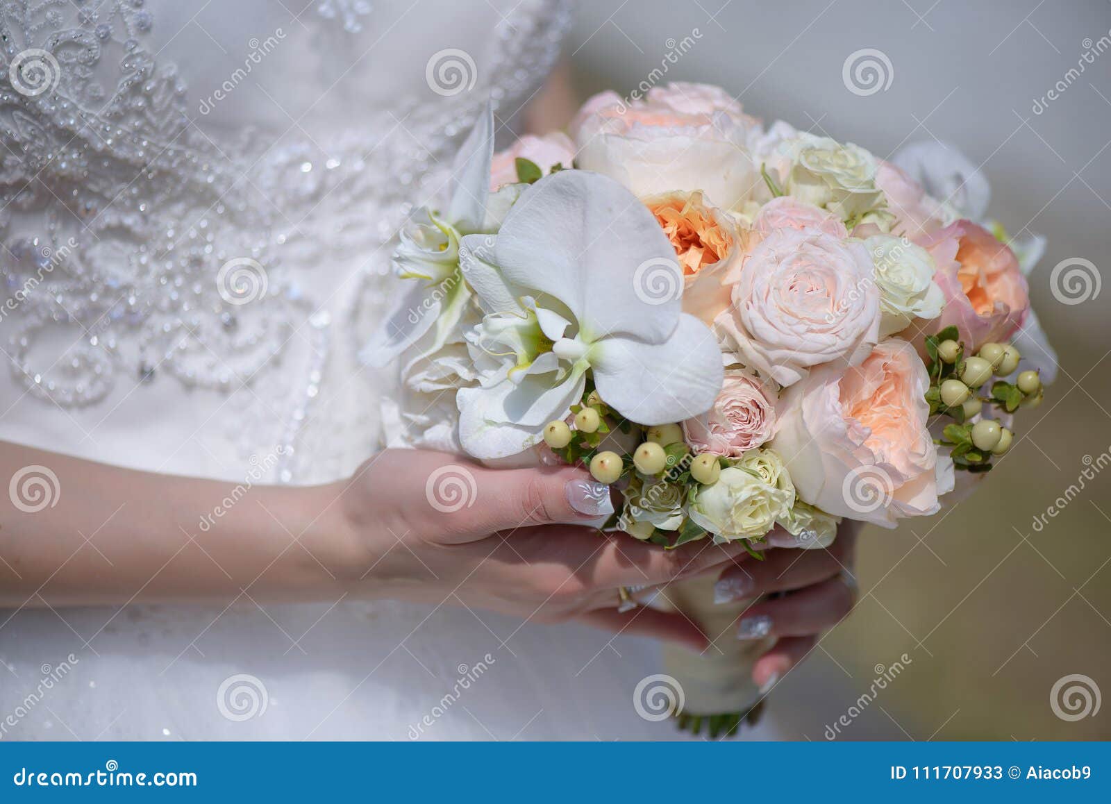 Young Caucasian Bride Wearing Beautiful Embellished Dress and Holding a ...