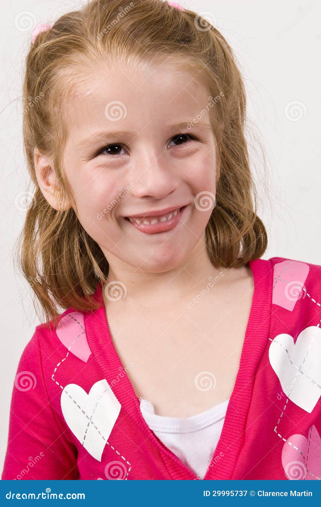 Young Girl in a Heart Sweater Making Funny Face Stock Image - Image of ...