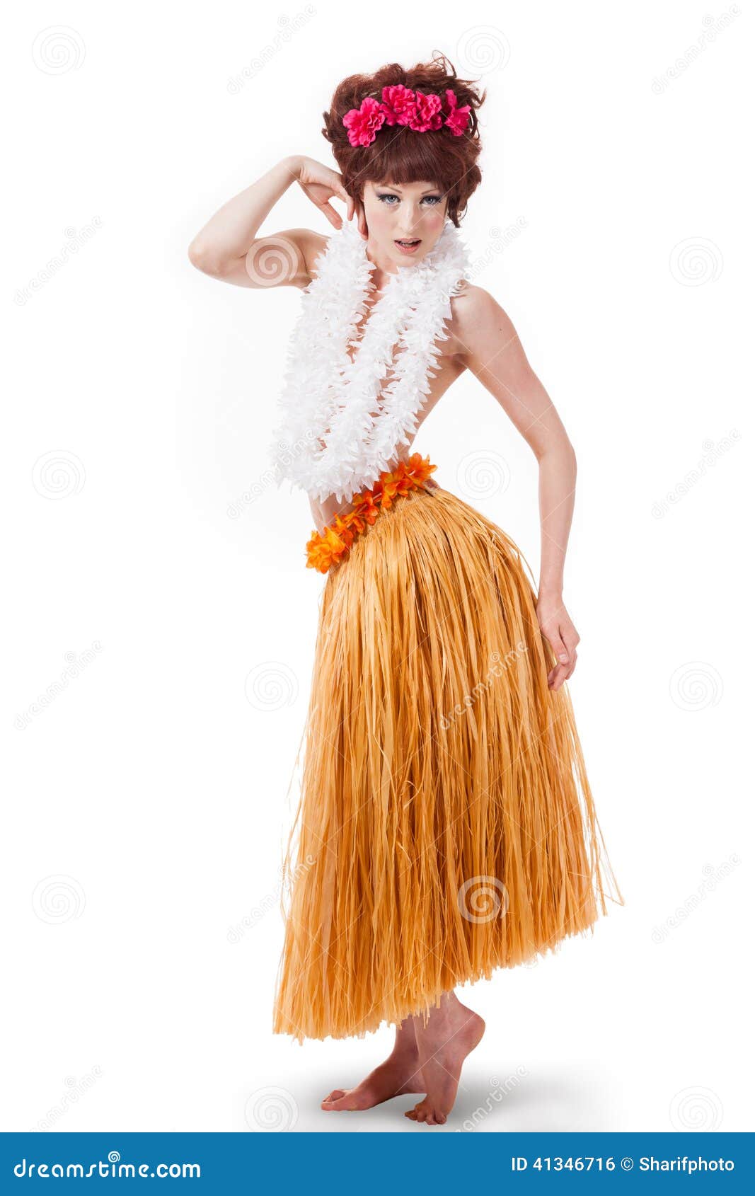 A Young Adult Female In A Traditional Grass Skirt And Lei Dances The Hula  And Smiles High-Res Stock Photo - Getty Images